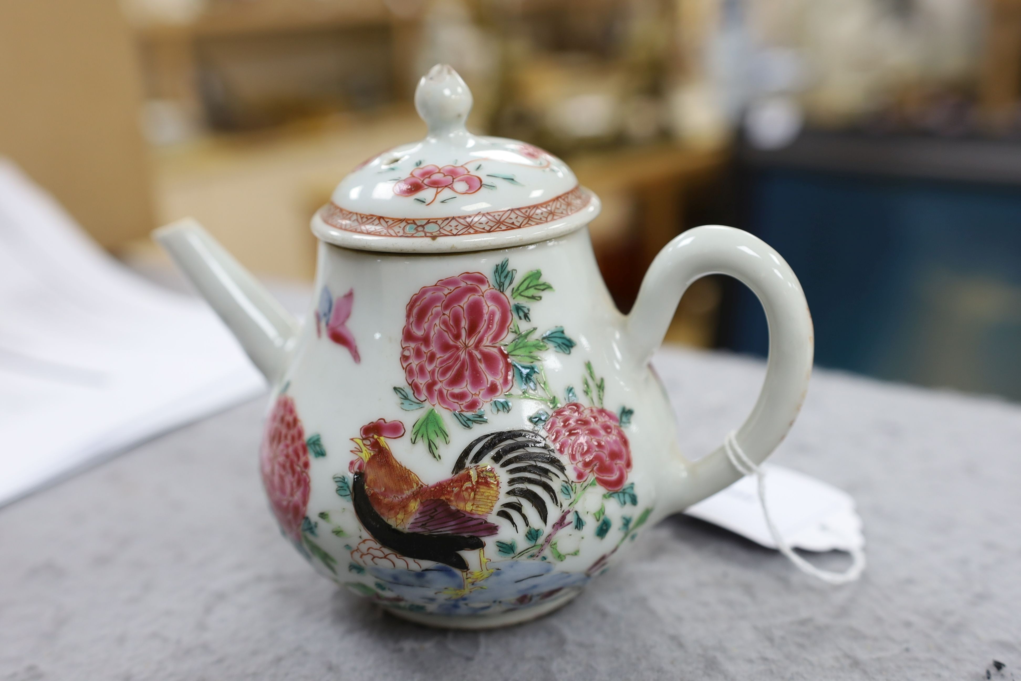 A Chinese famille rose ‘cockerel’ teapot, Yongzheng period, 12 cms high, 11.5cm high